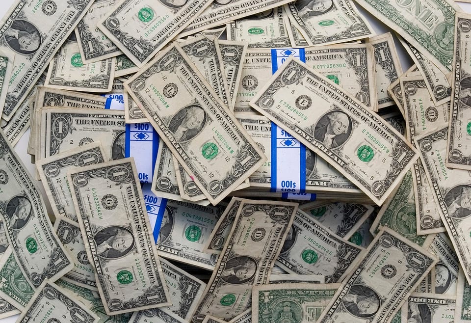 Banknotes from several countries laid out